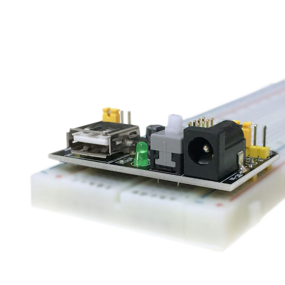 Fumlebræt/Breadboard strømforsyning med et Fumlebræt/Breadboard